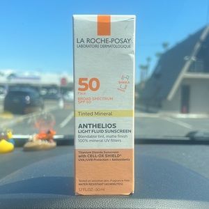 Sunscreen - tinted spf 50 - brand new  unopened face sunscreen